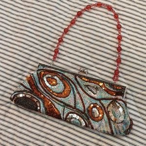 Retro beaded clutch